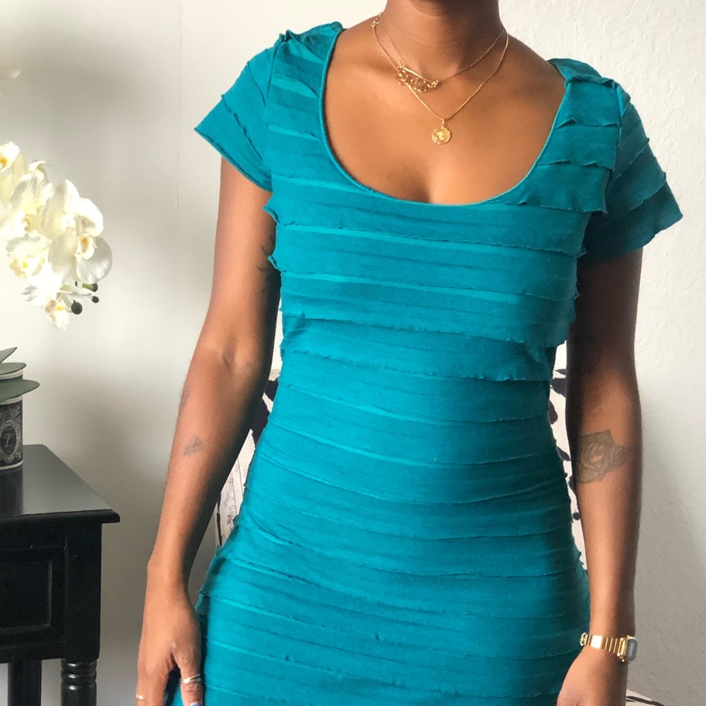Scoop neck cap sleeve fitted ruffle dress